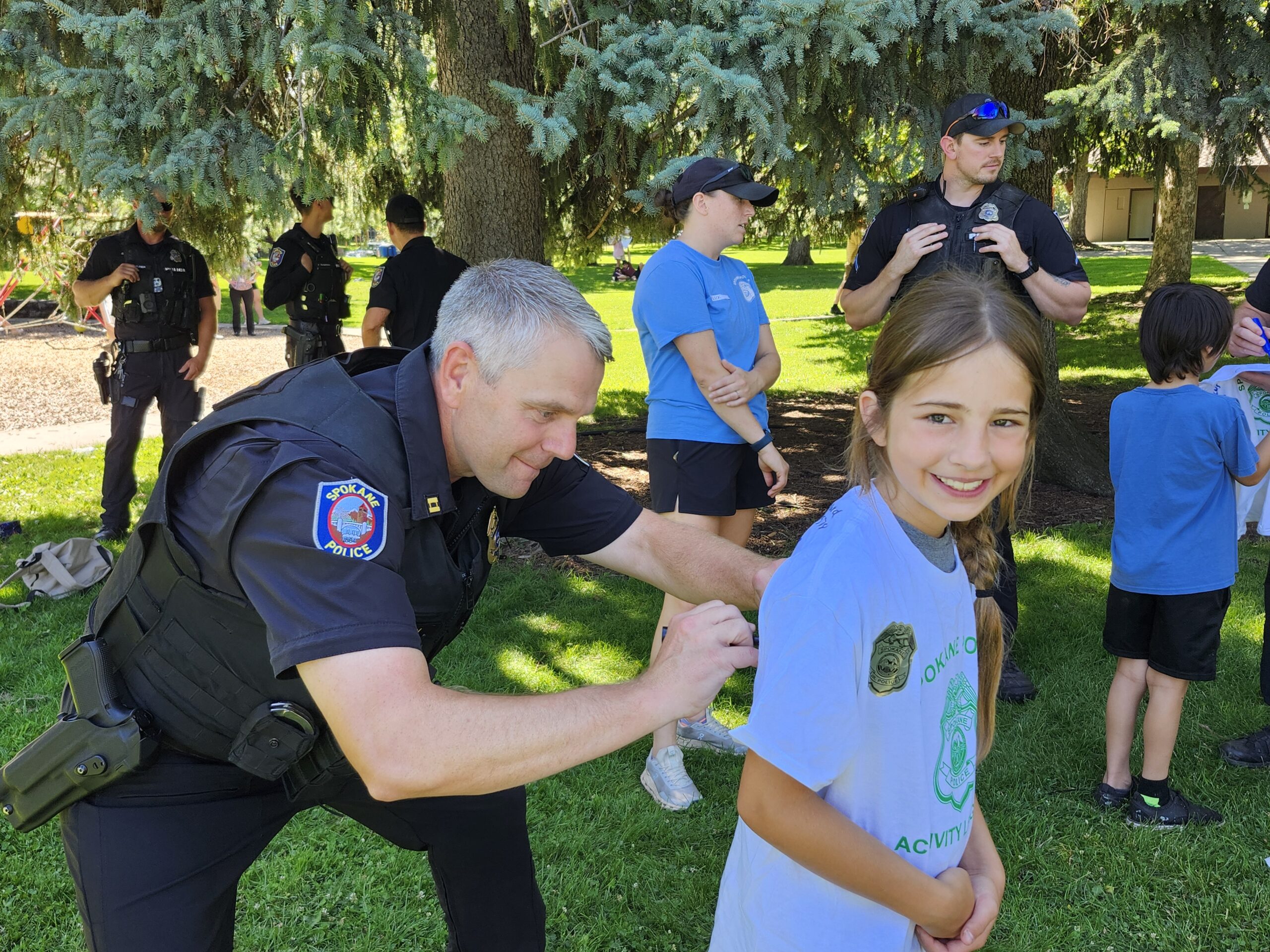 Aria getting her shirt signed by Captain Jensen